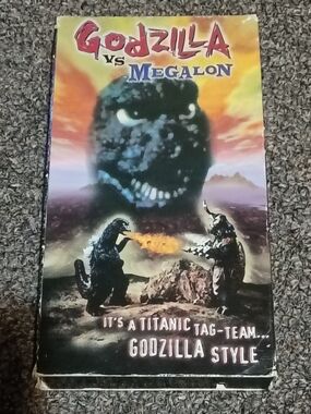 Godzilla vs. Megalon VHS Movie Tape - Black/Orange Artwork